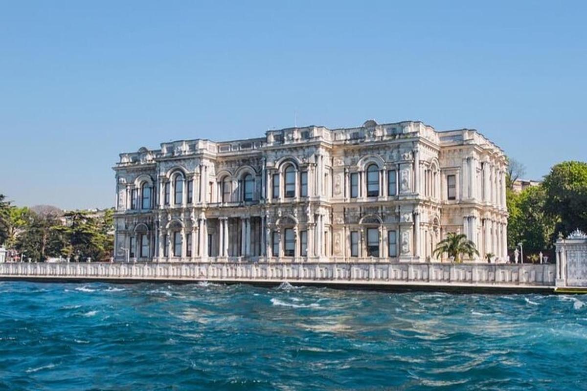 a large building with water in front of it