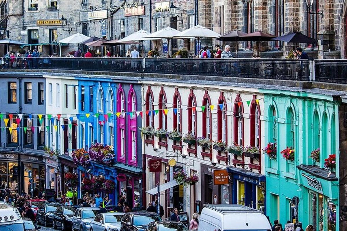 a busy city street with colorful buildings and cars
