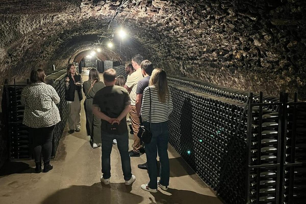 a group of people standing in a tunnel
