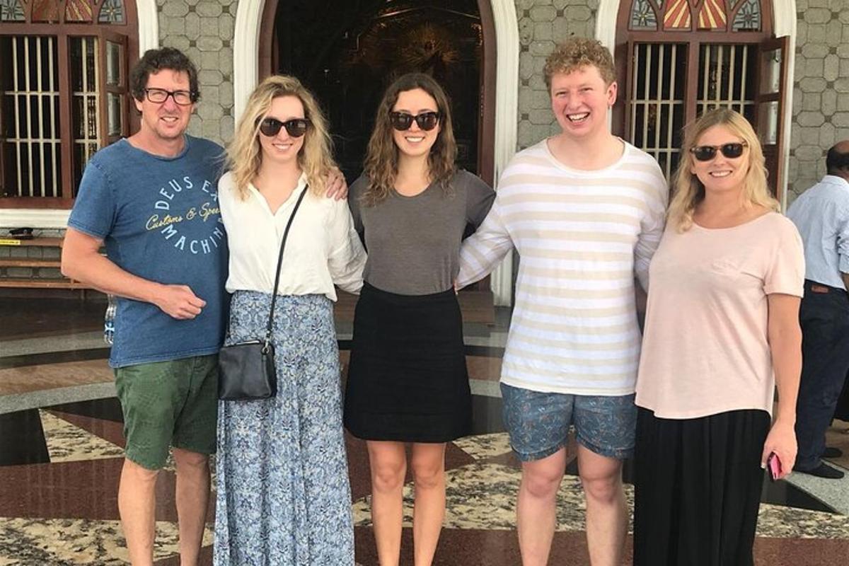 a group of people standing in front of a building