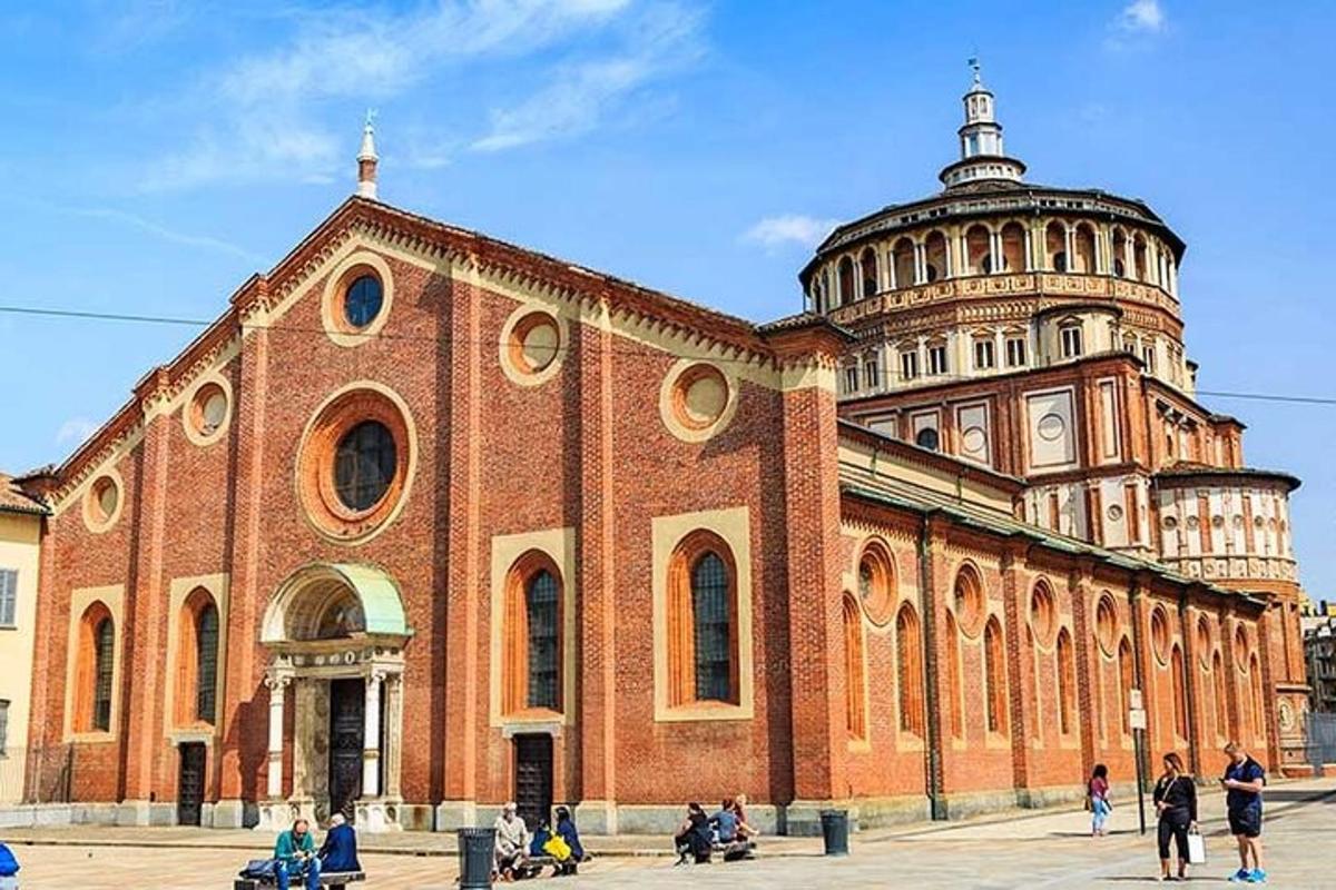 a large brick building with a tower on top of it