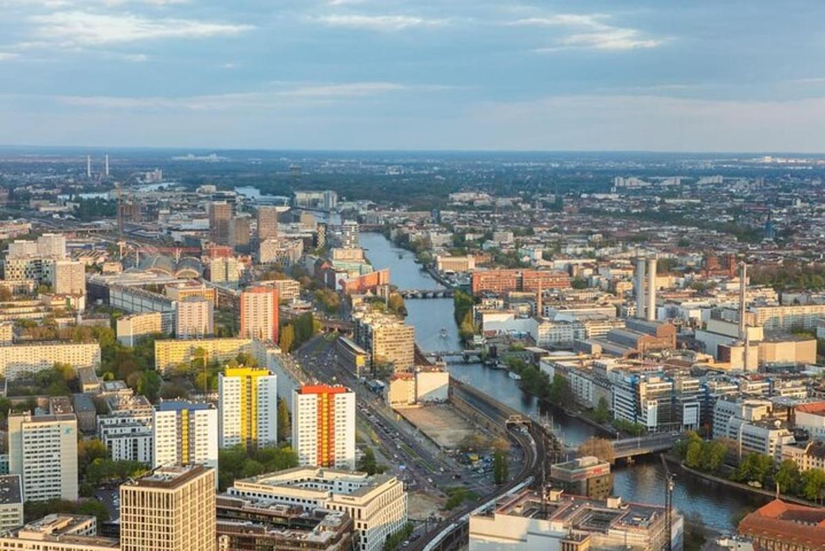 an aerial view of a city with a river