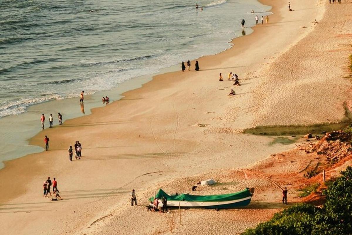 a group of people on a beach with a boat