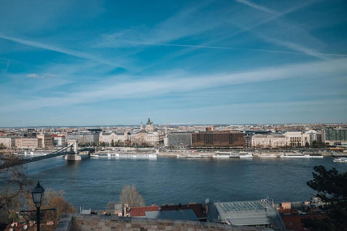 a view of a river in a city with a bridge