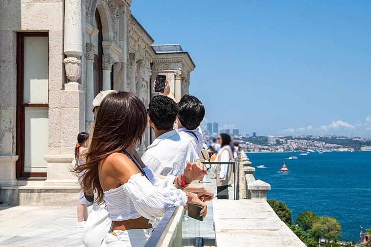 a group of people looking out over the ocean