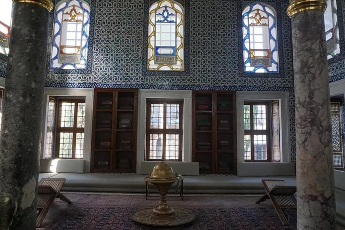 a room with stained glass windows in a building