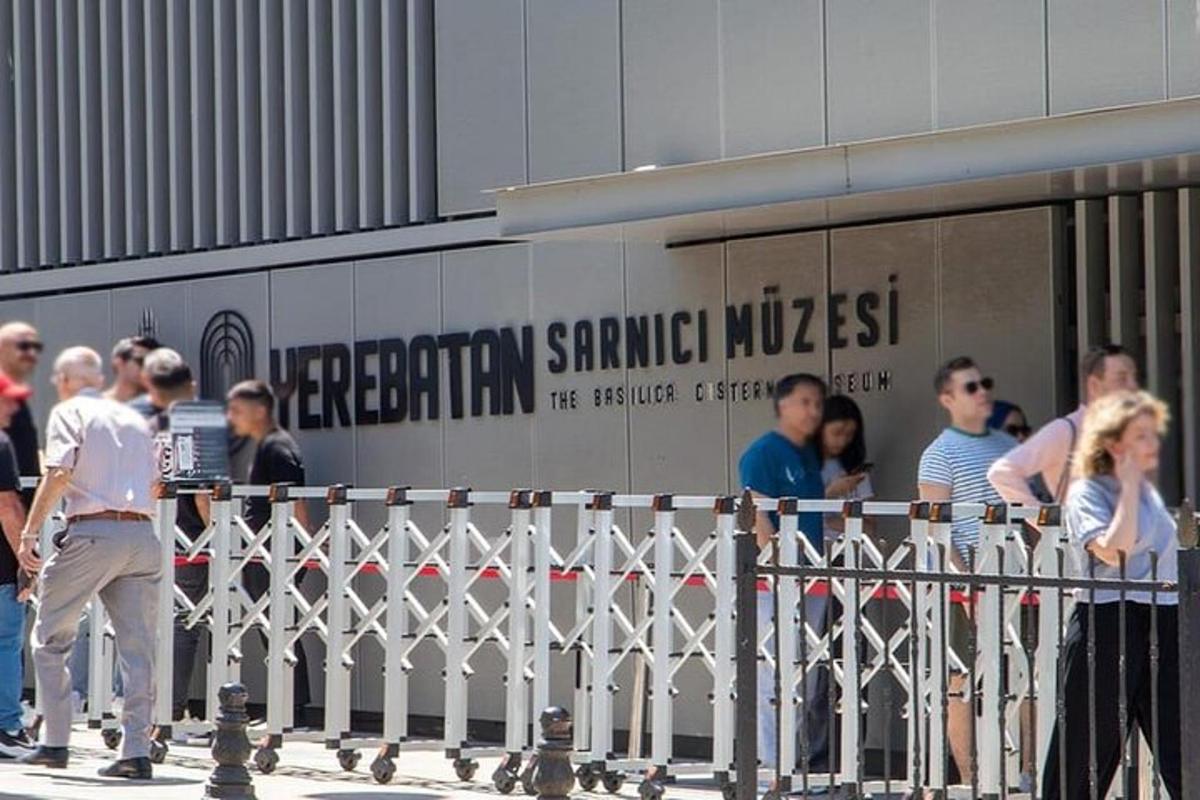 a group of people standing outside of a building