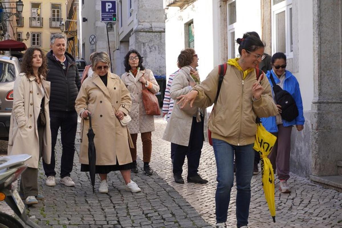 a group of people walking down a street