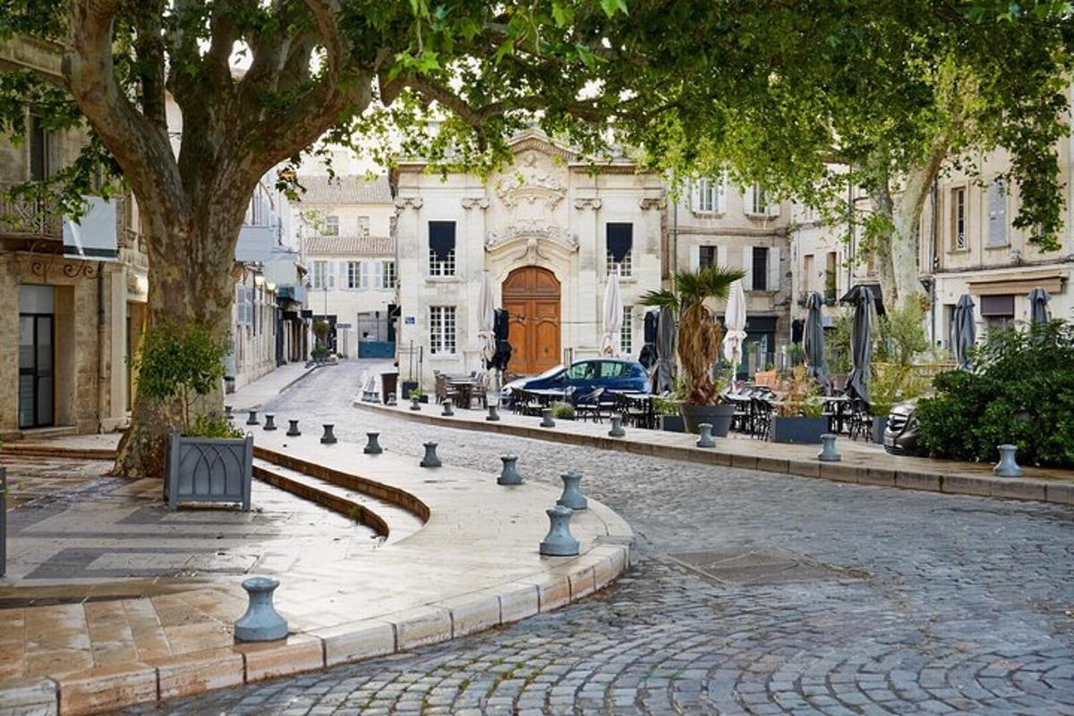a cobblestone street in front of a building