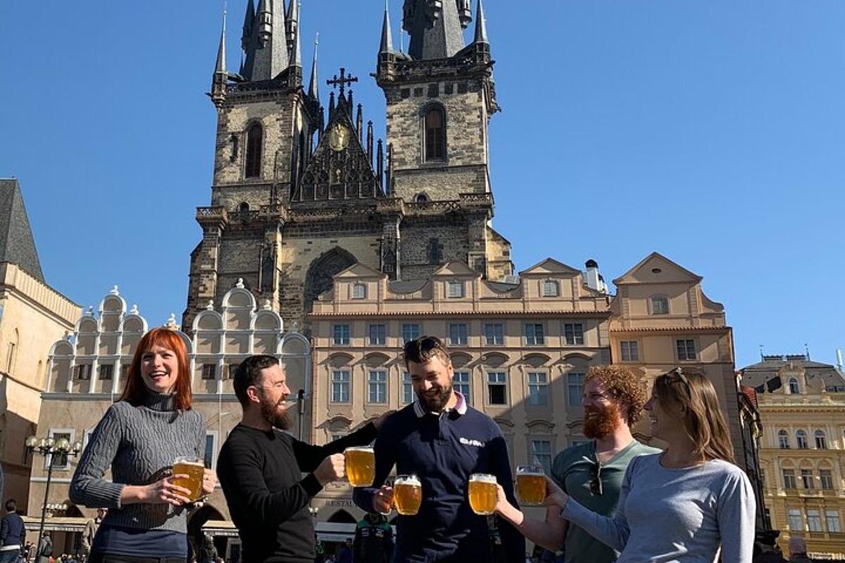 a group of people drinking beer in front of a building