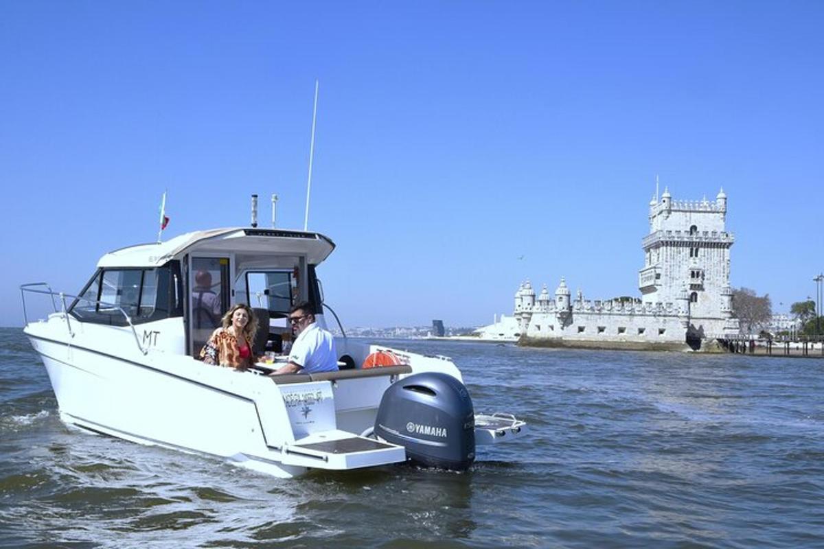 a man and a woman riding a boat in the water