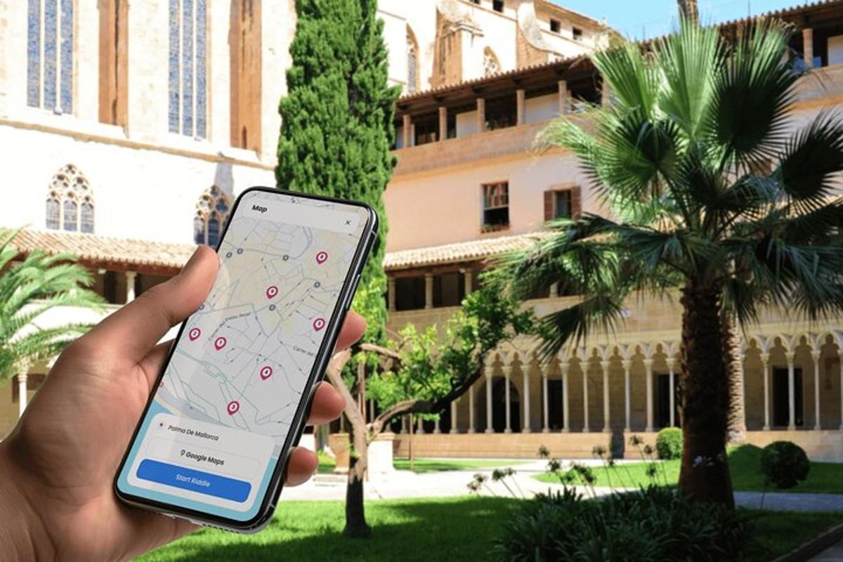 a person holding a cell phone in front of a building