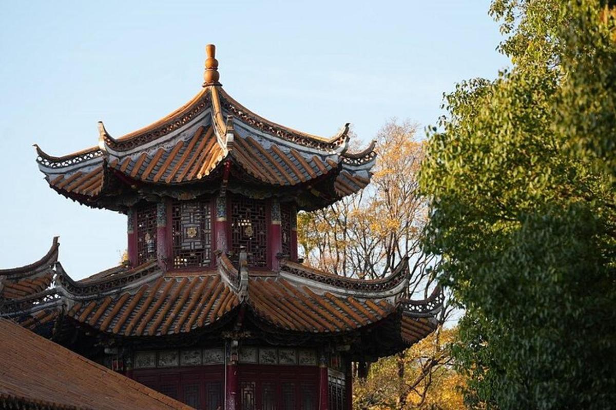 a pagoda with a roof on top of a building
