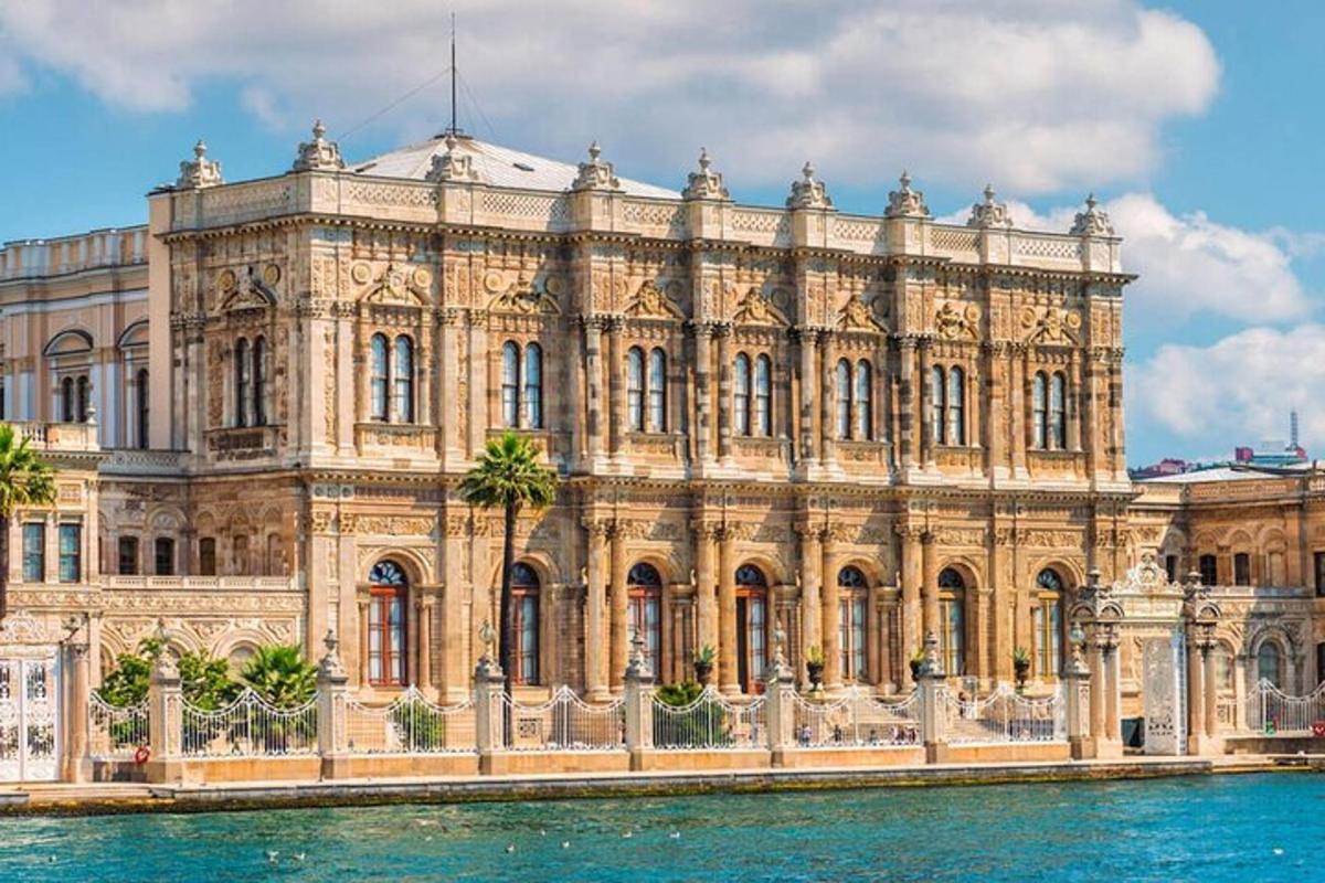 a large building with water in front of it