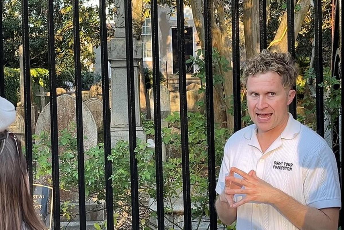 a man standing in front of a gate