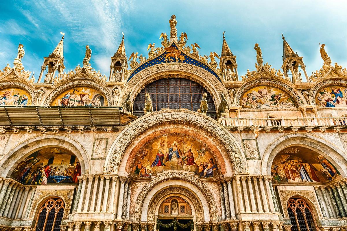 a large building with lots of paintings on it