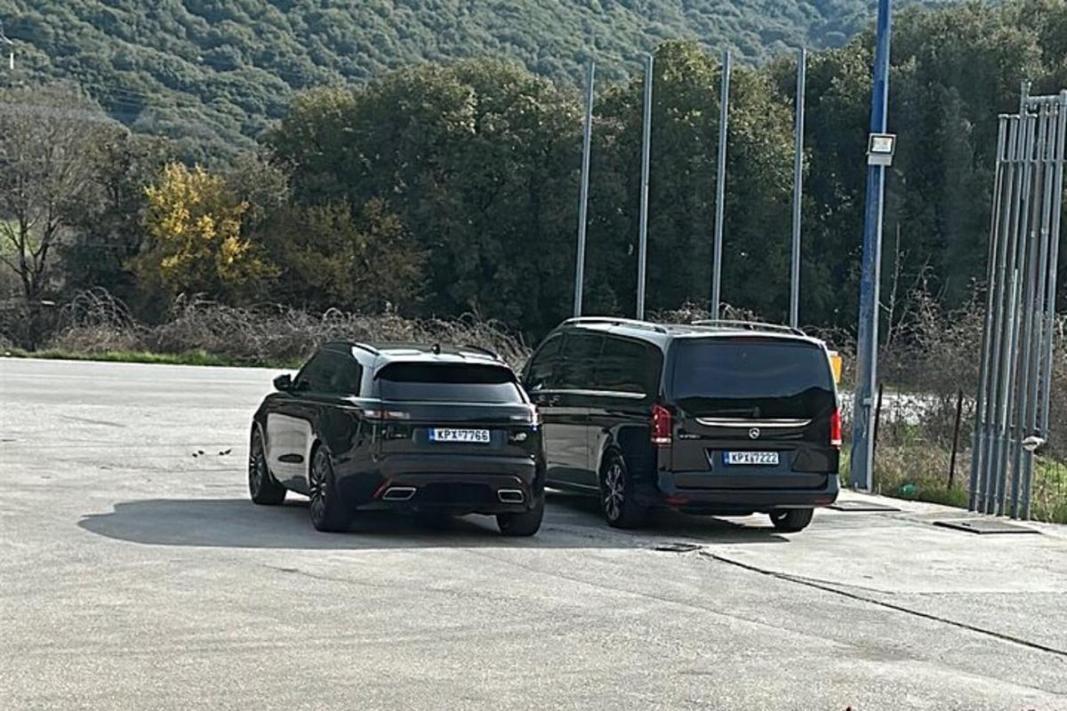 two trucks parked next to each other in a parking lot