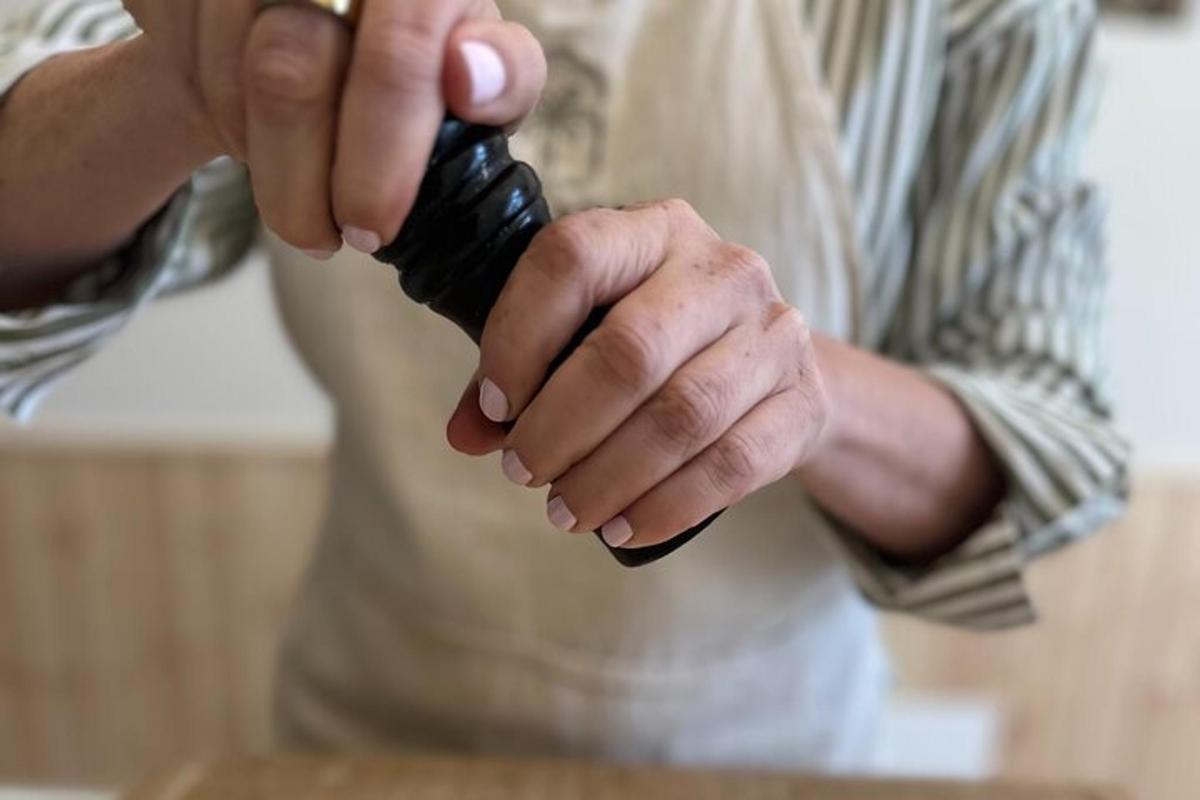 a person holding a hair dryer in their hands