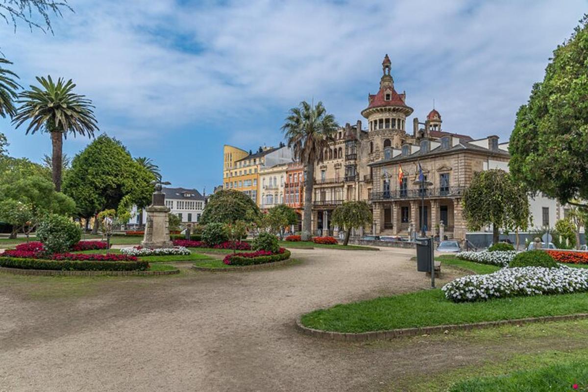 a large building with a park in front of it