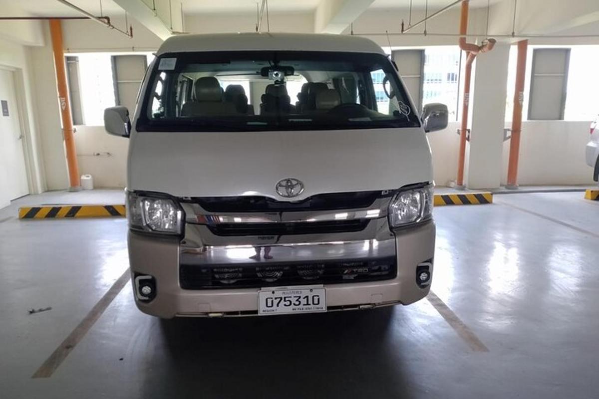 a white van is parked in a garage