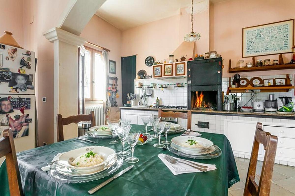 a kitchen with a table with plates of food on it