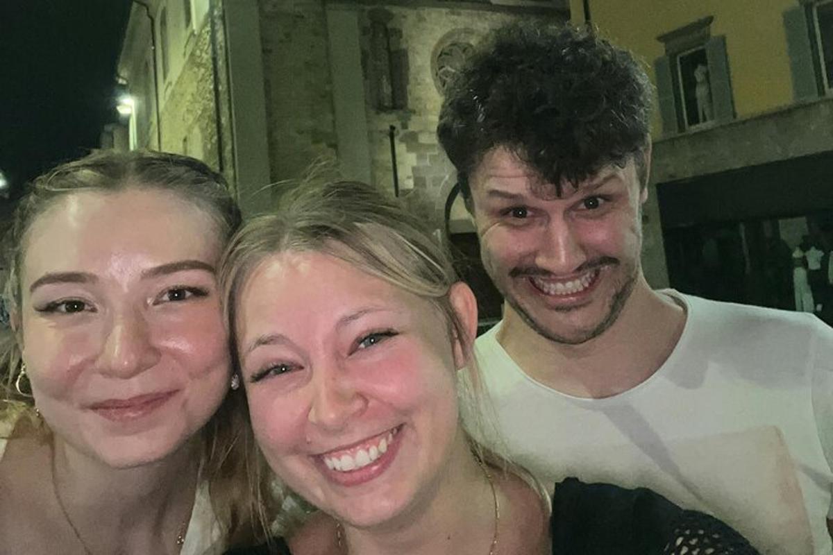 a man and two women posing for a picture