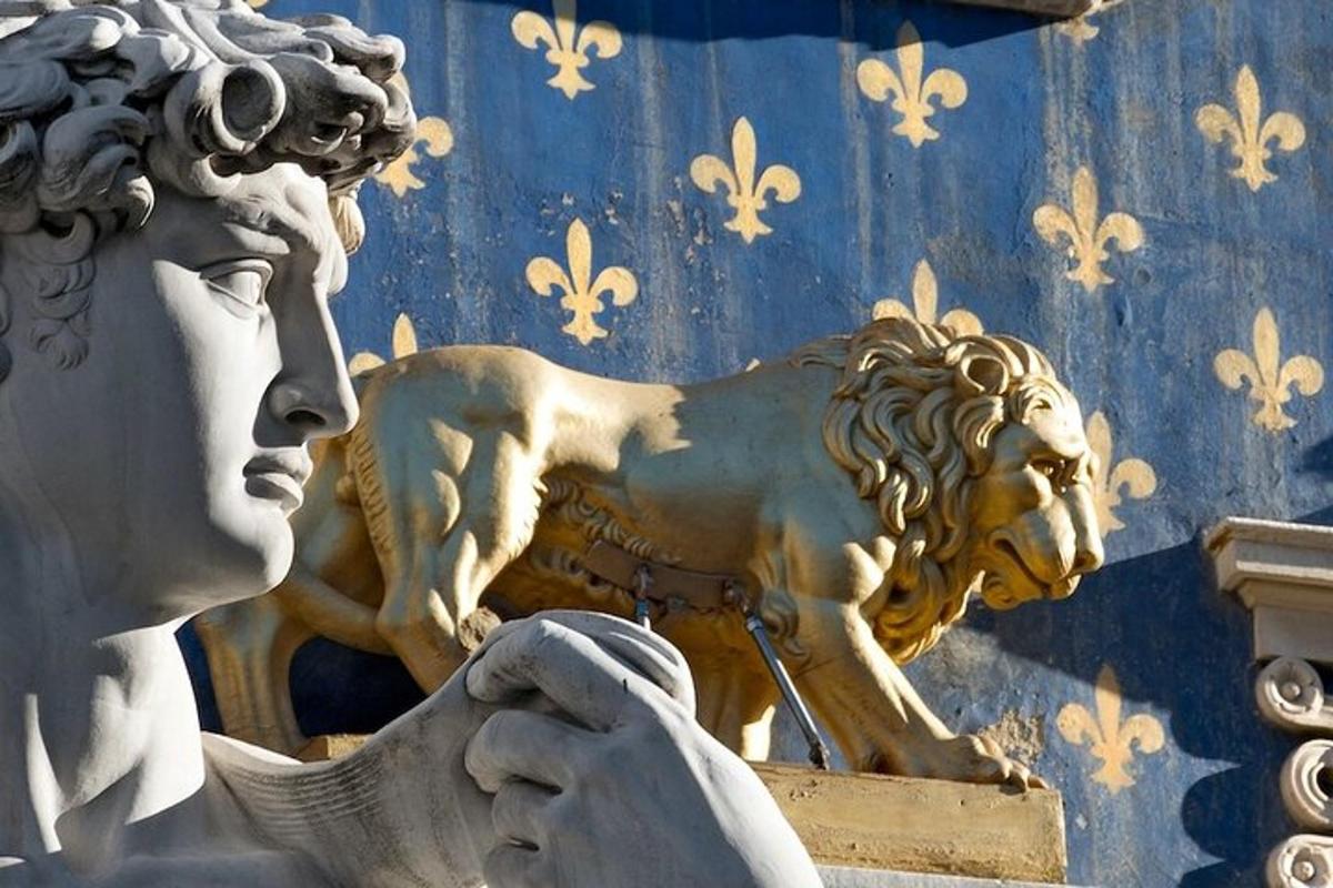 a statue of a woman with a horse on a wall