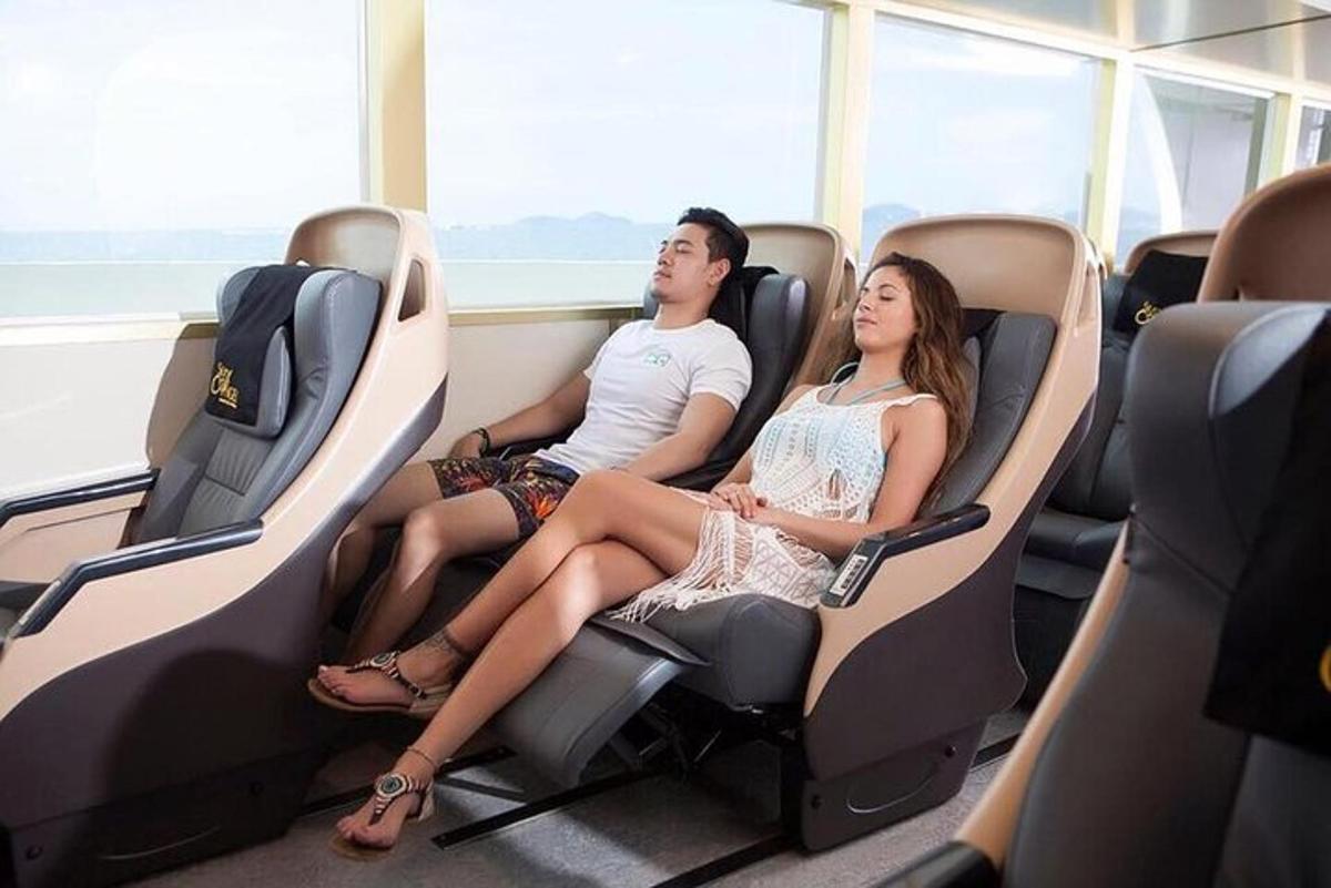 a man and a woman sitting on an airplane