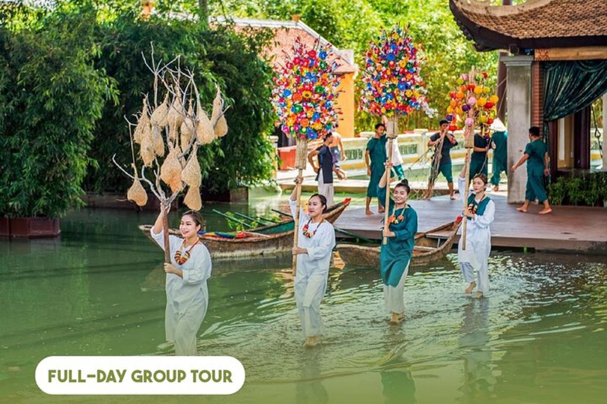 a group of women standing in the water in a river