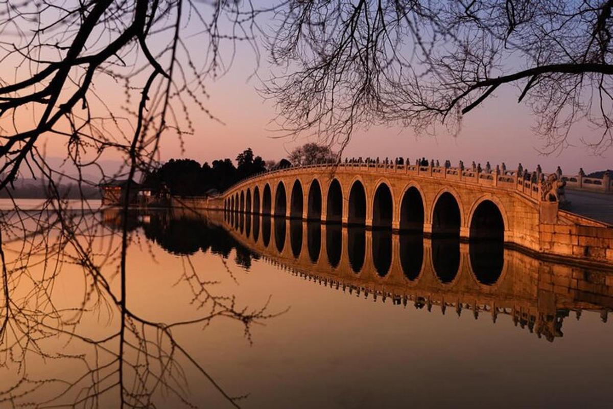 a bridge over a body of water with people on it