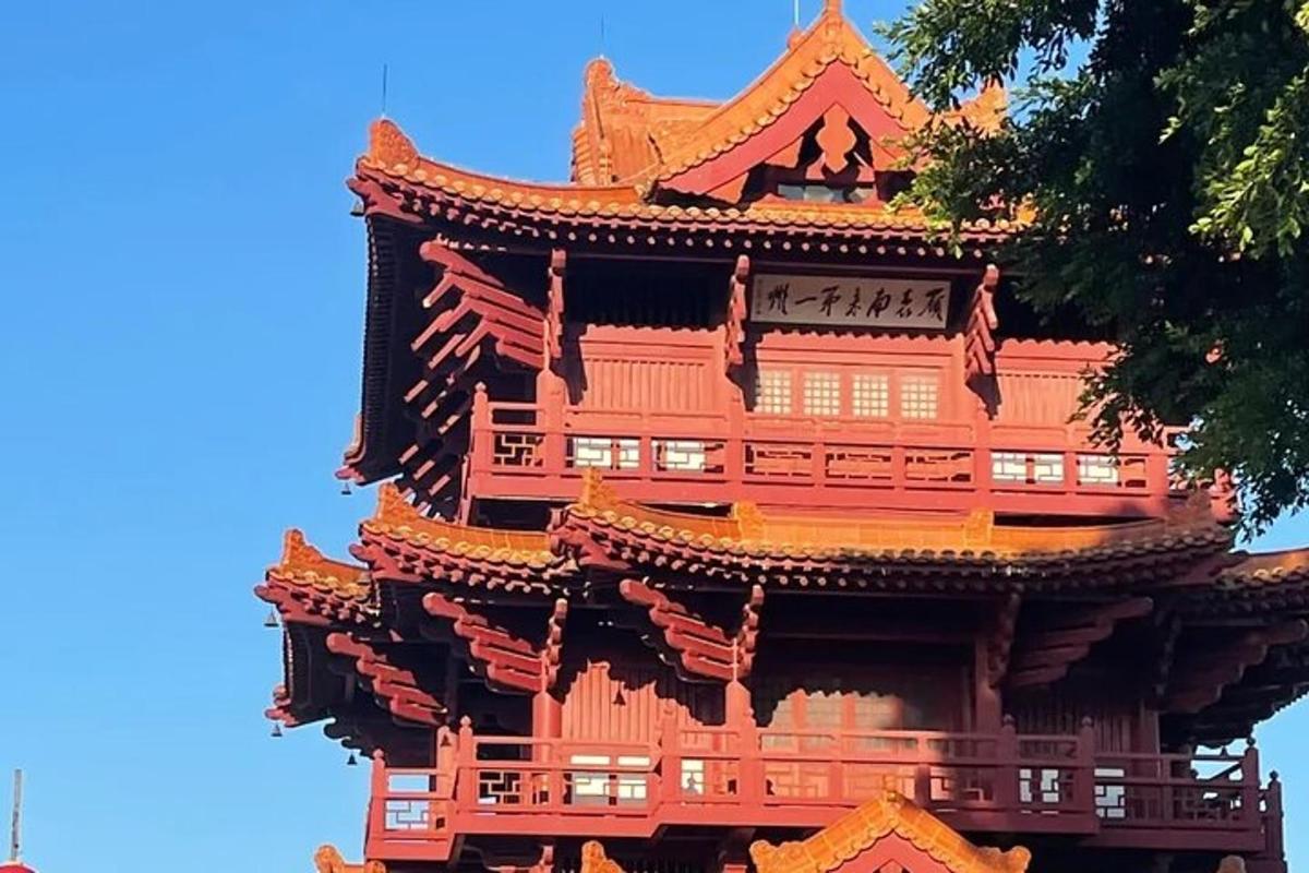 a pagoda building with a blue sky in the background