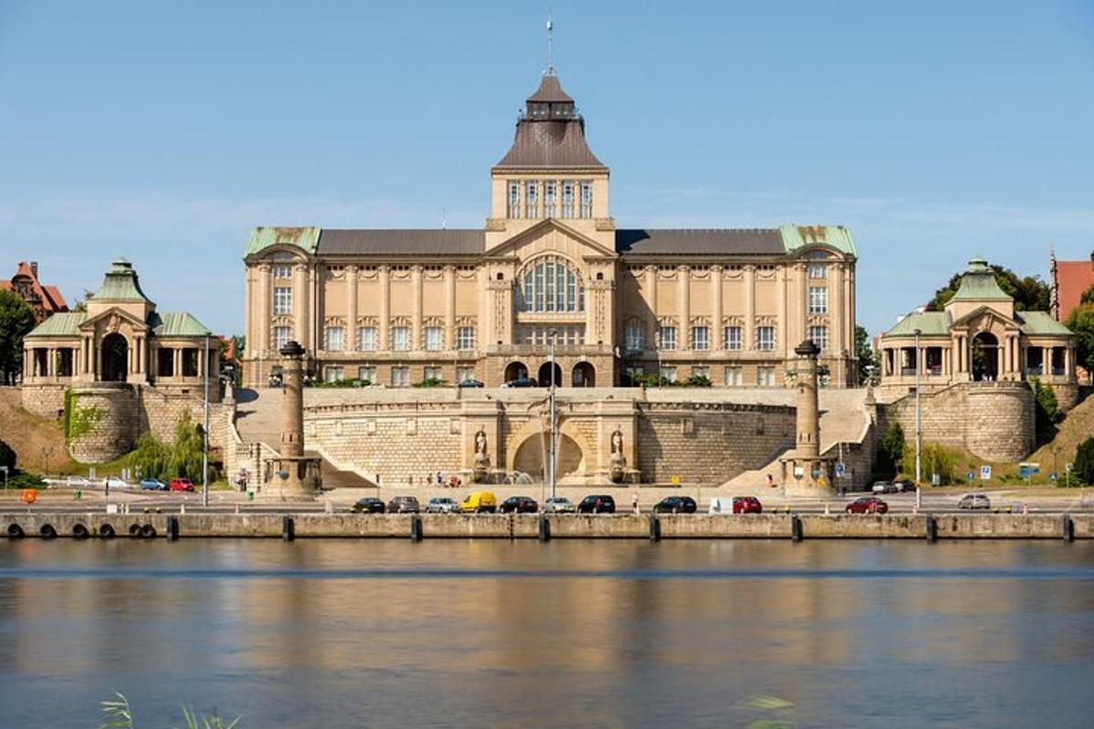 a large building next to a body of water
