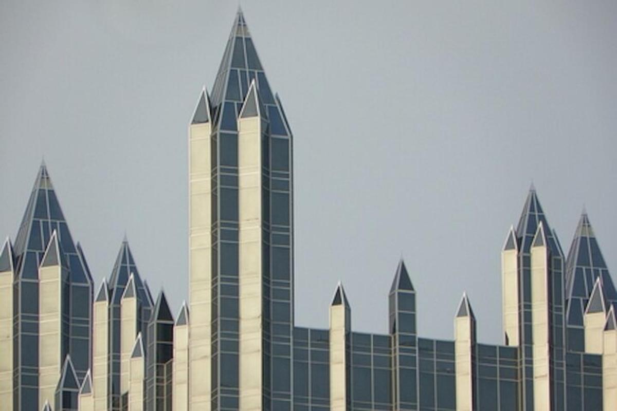 an illustration of a building with tall skyscrapers