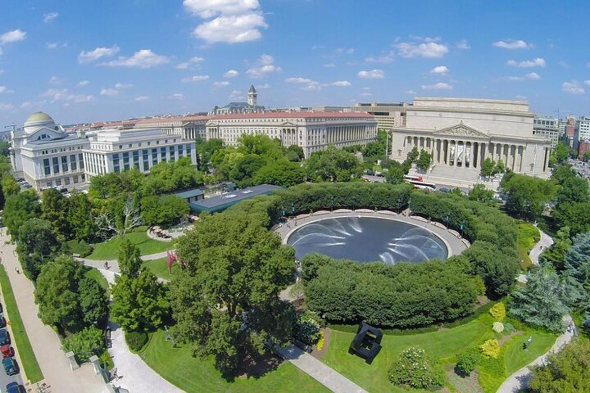 an overhead view of a large building with a park