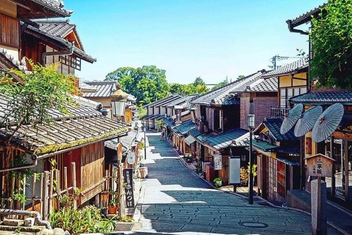 a street in an asian town with many buildings