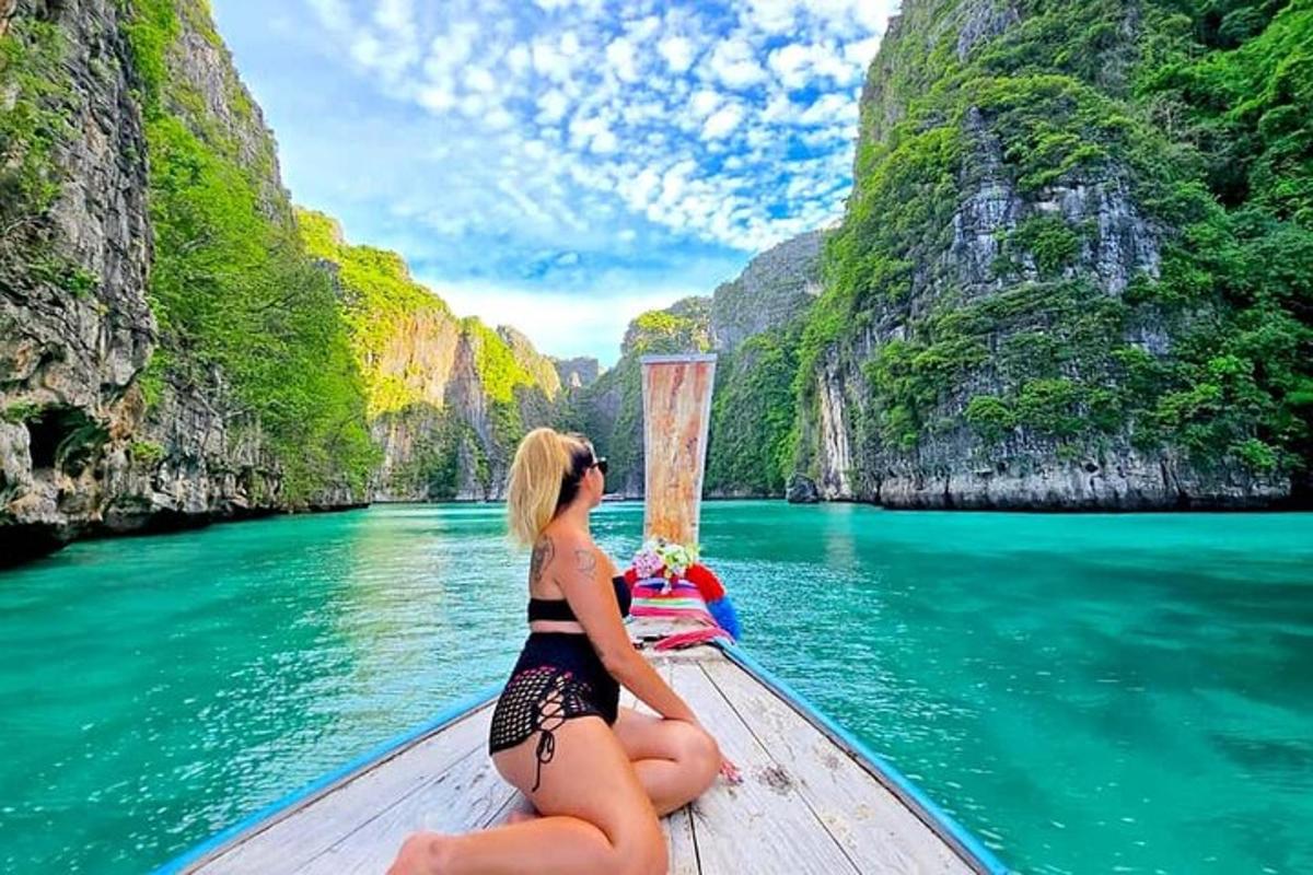 a woman sitting on a boat in a body of water