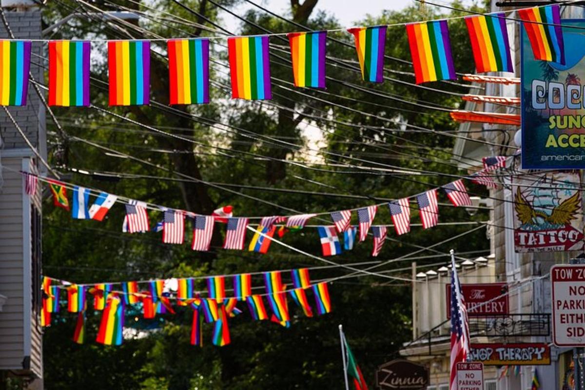 a bunch of flags are hanging on a string
