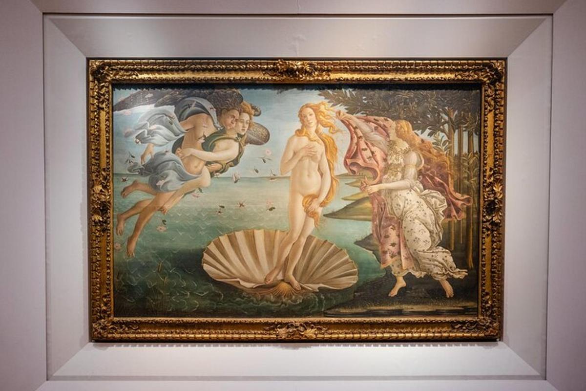 a painting in a frame on a wall