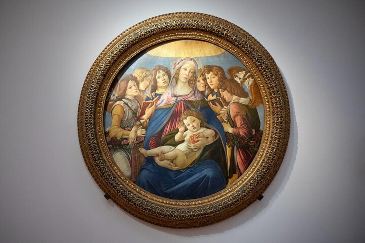 a framed painting of a group of people