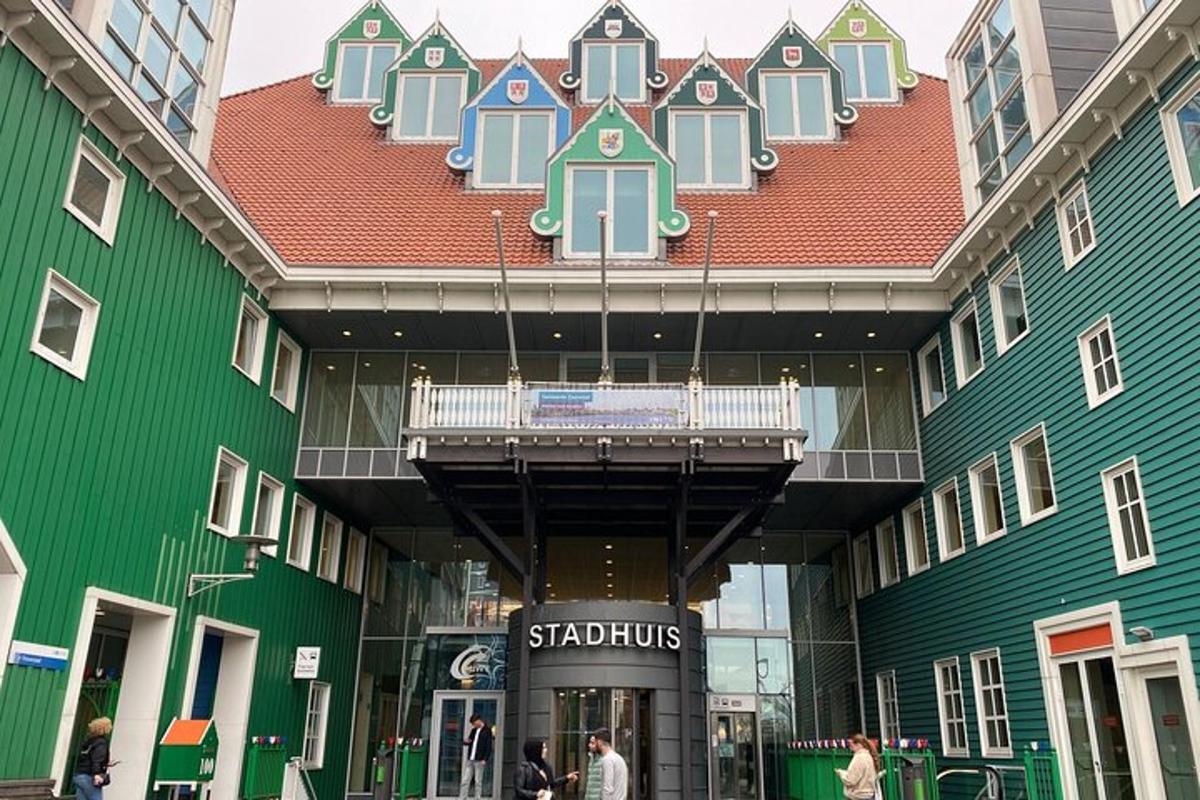 a shopping center with a large building with a deck