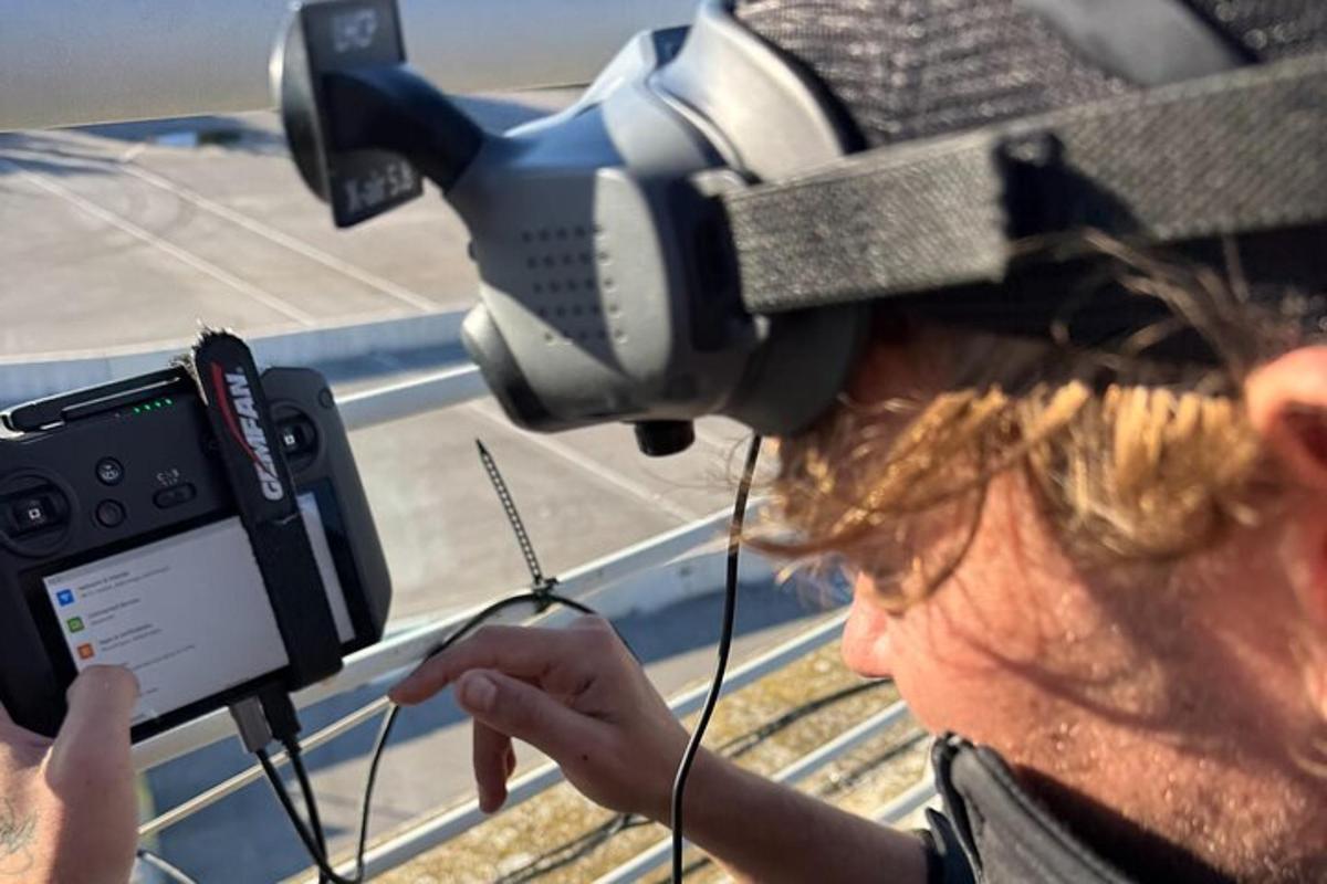 a woman with a video camera on her head