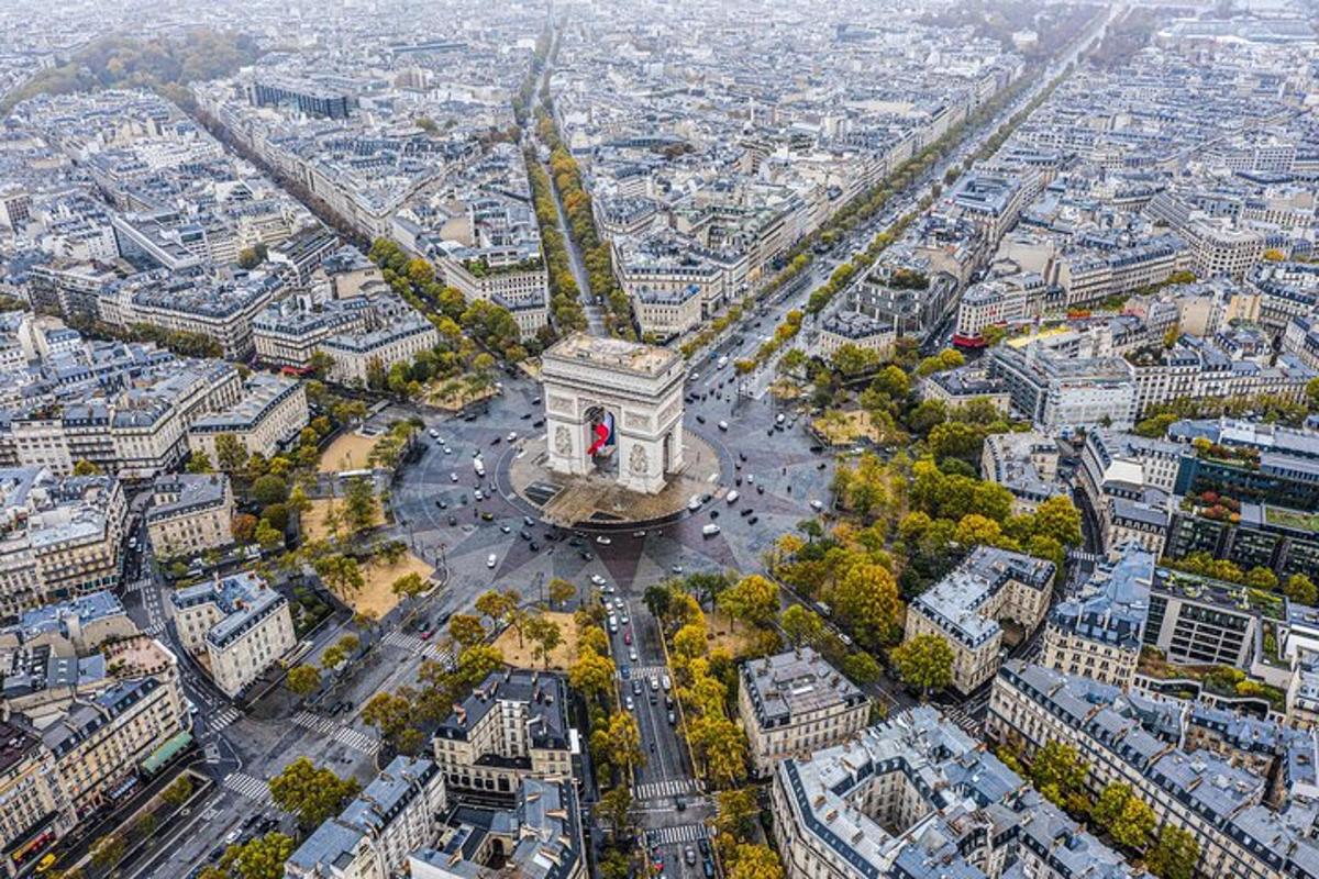 an aerial view of a city with a clock tower