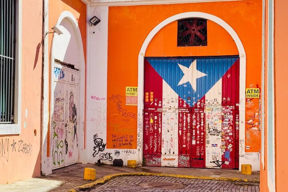 an orange building with a door with a flag on it
