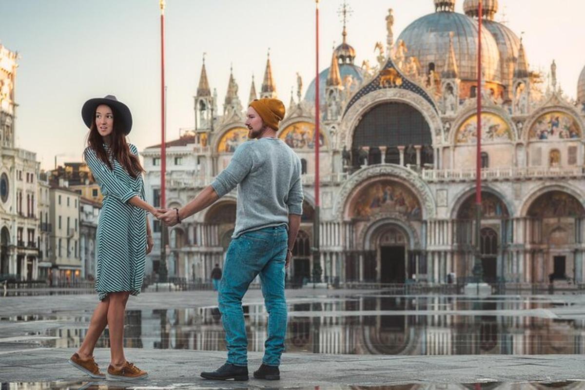 a man and woman holding hands in front of a building