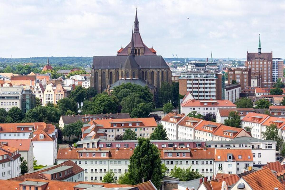 a view of a city with buildings and a church