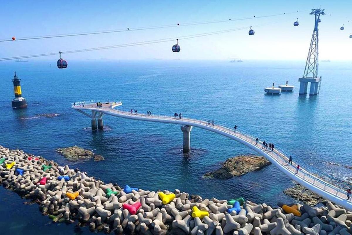 a bridge over a body of water with people on it
