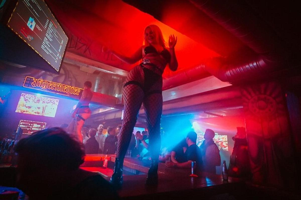 a woman dancing on a dance floor in a club