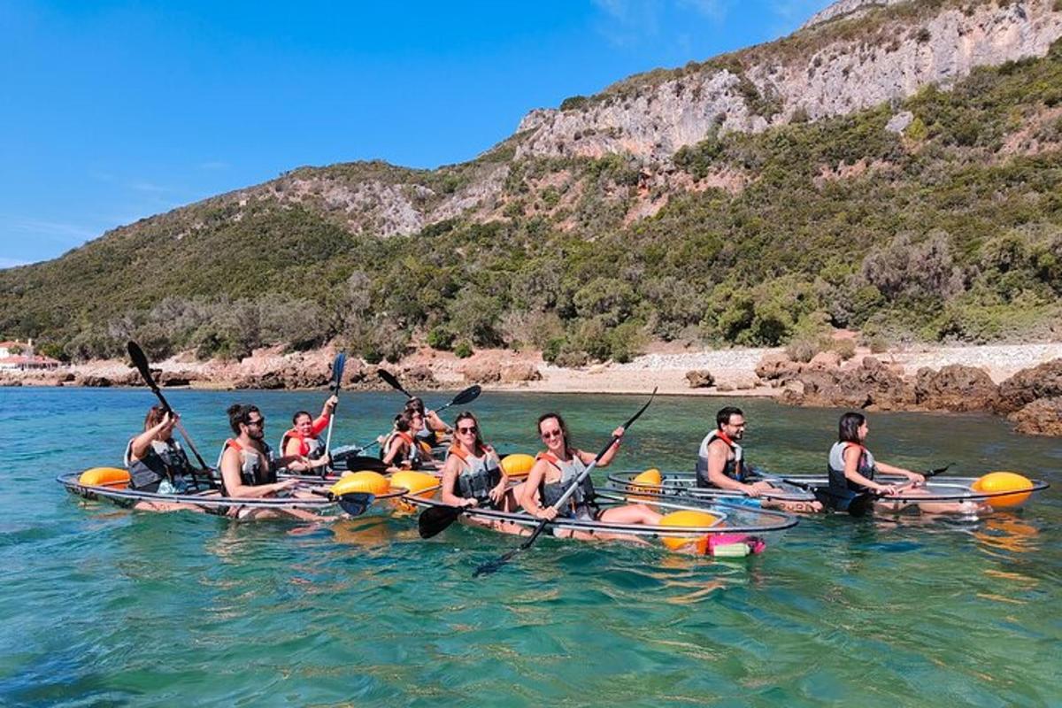 a group of people in kayaks in the water