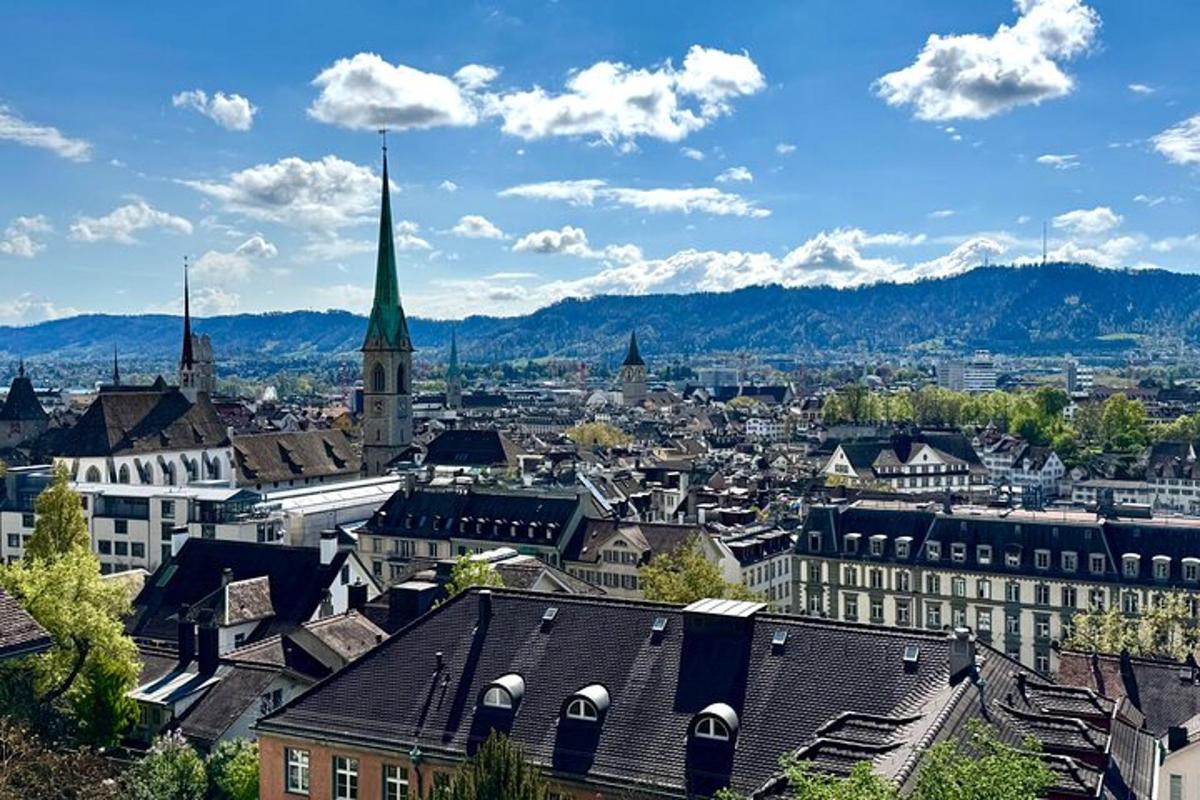 an aerial view of a city with a church