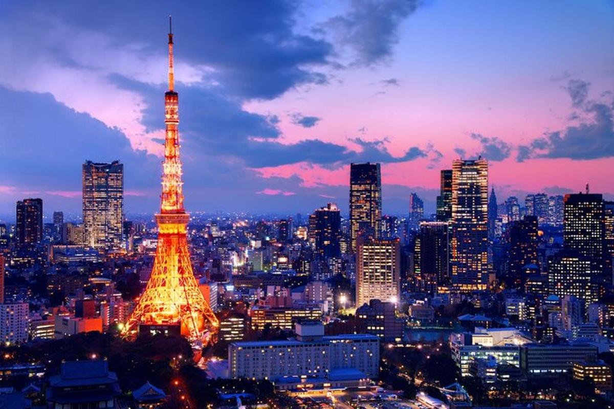 uno skyline della città con la torre Eiffel di notte